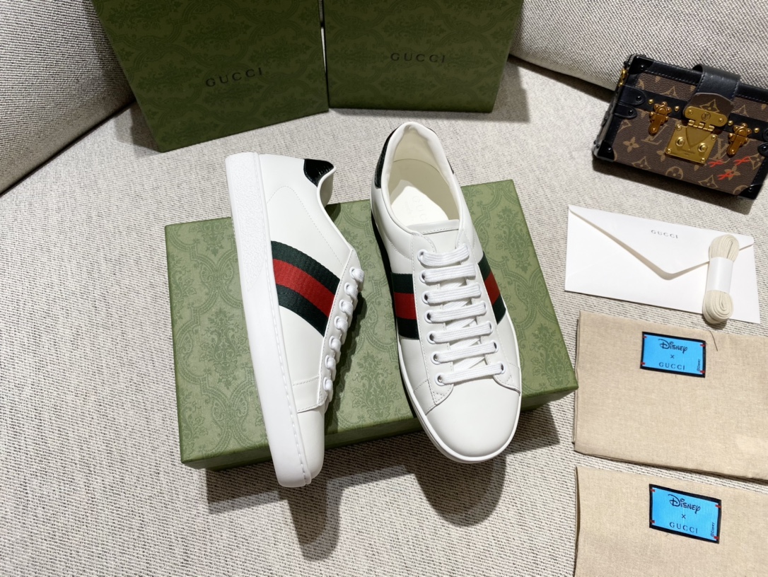 G*u*i sneakers