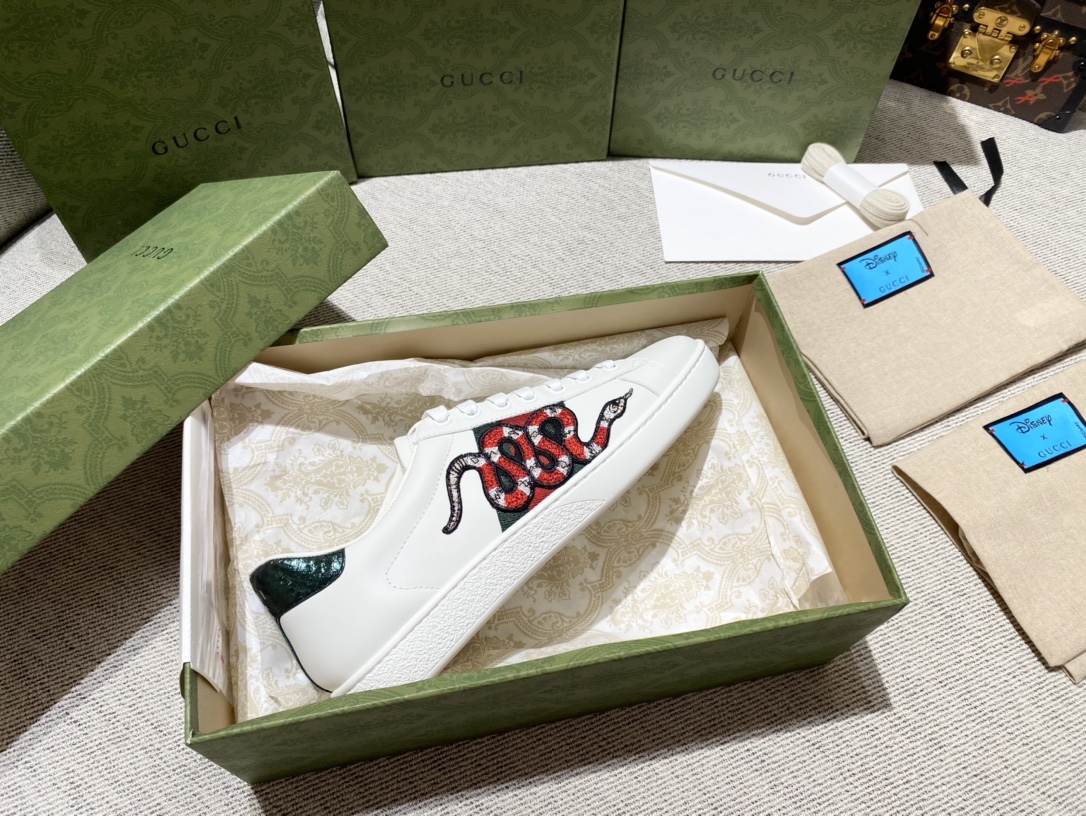 G*u*i sneakers