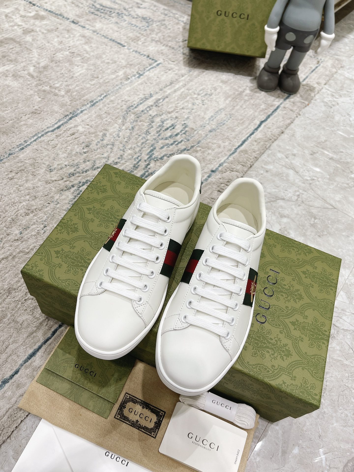 G*u*i sneakers