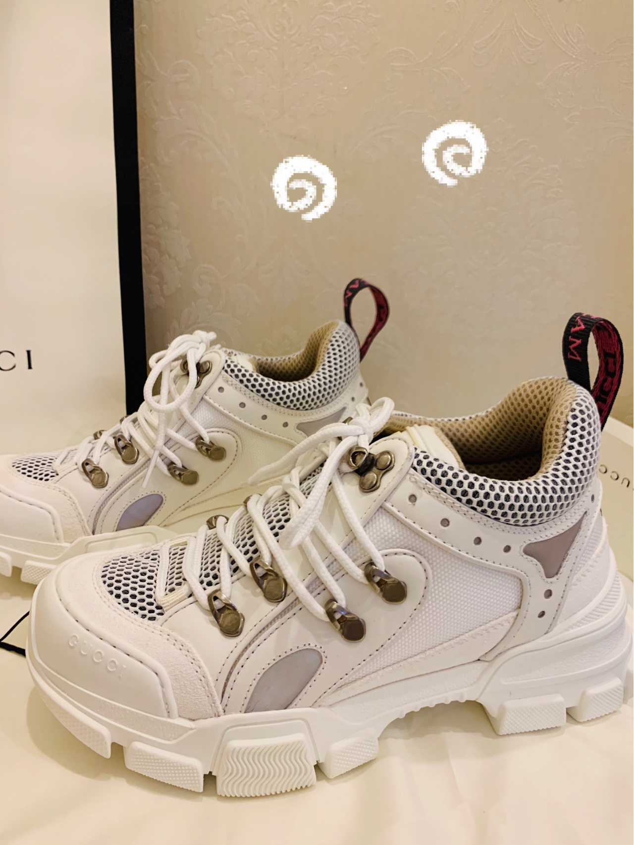 G*u*i sneakers