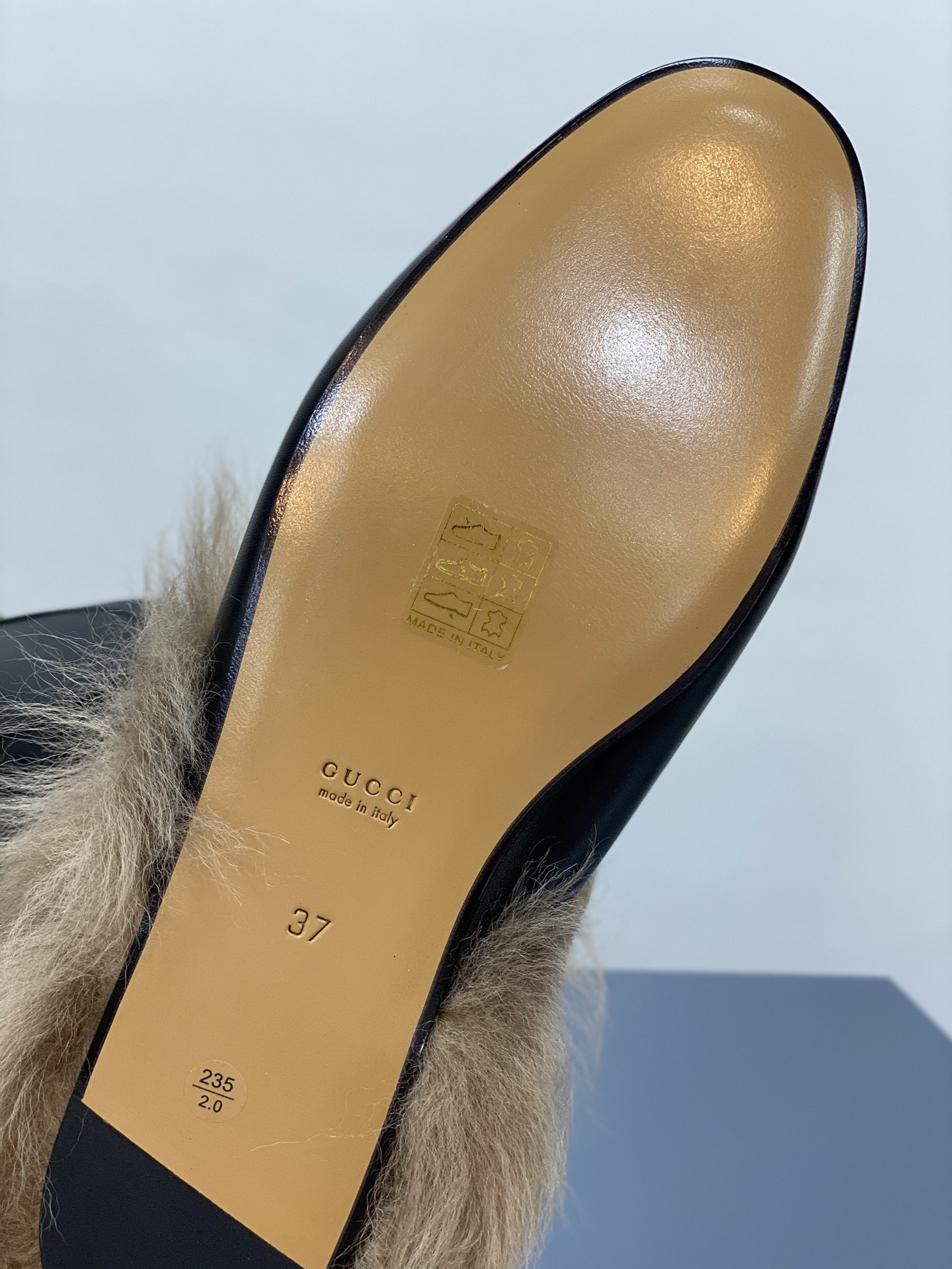 G*u*i loafers