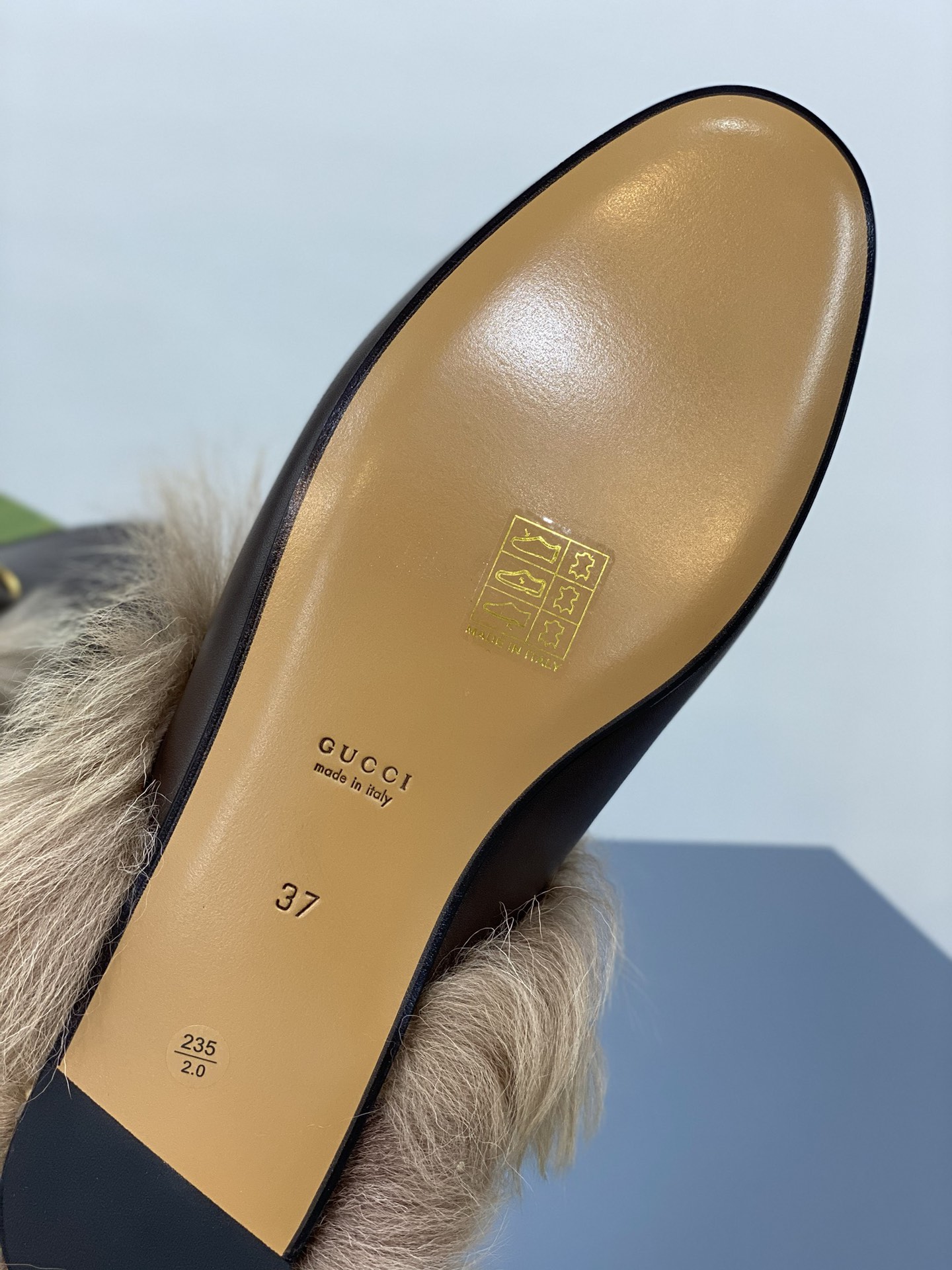 G*u*i loafers
