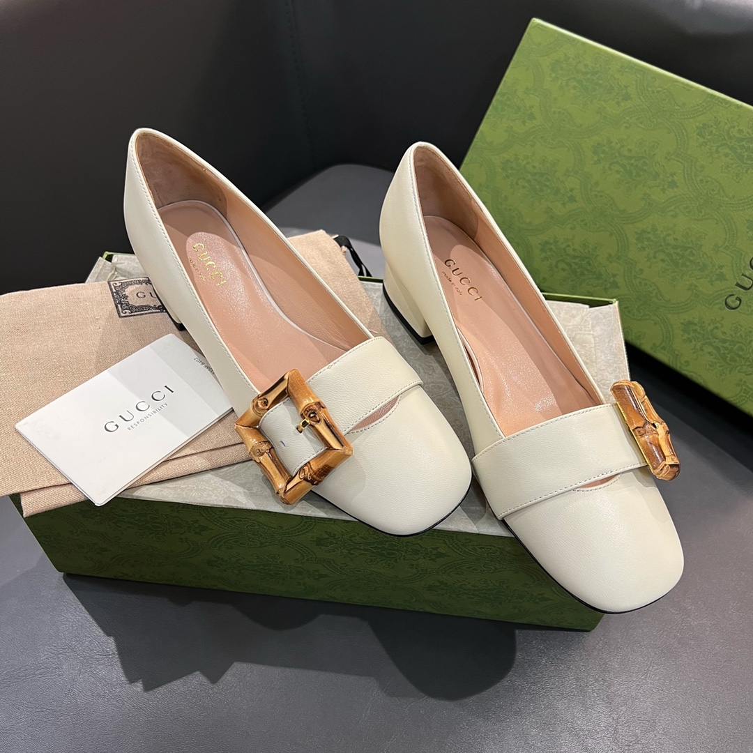 G*u*i loafers