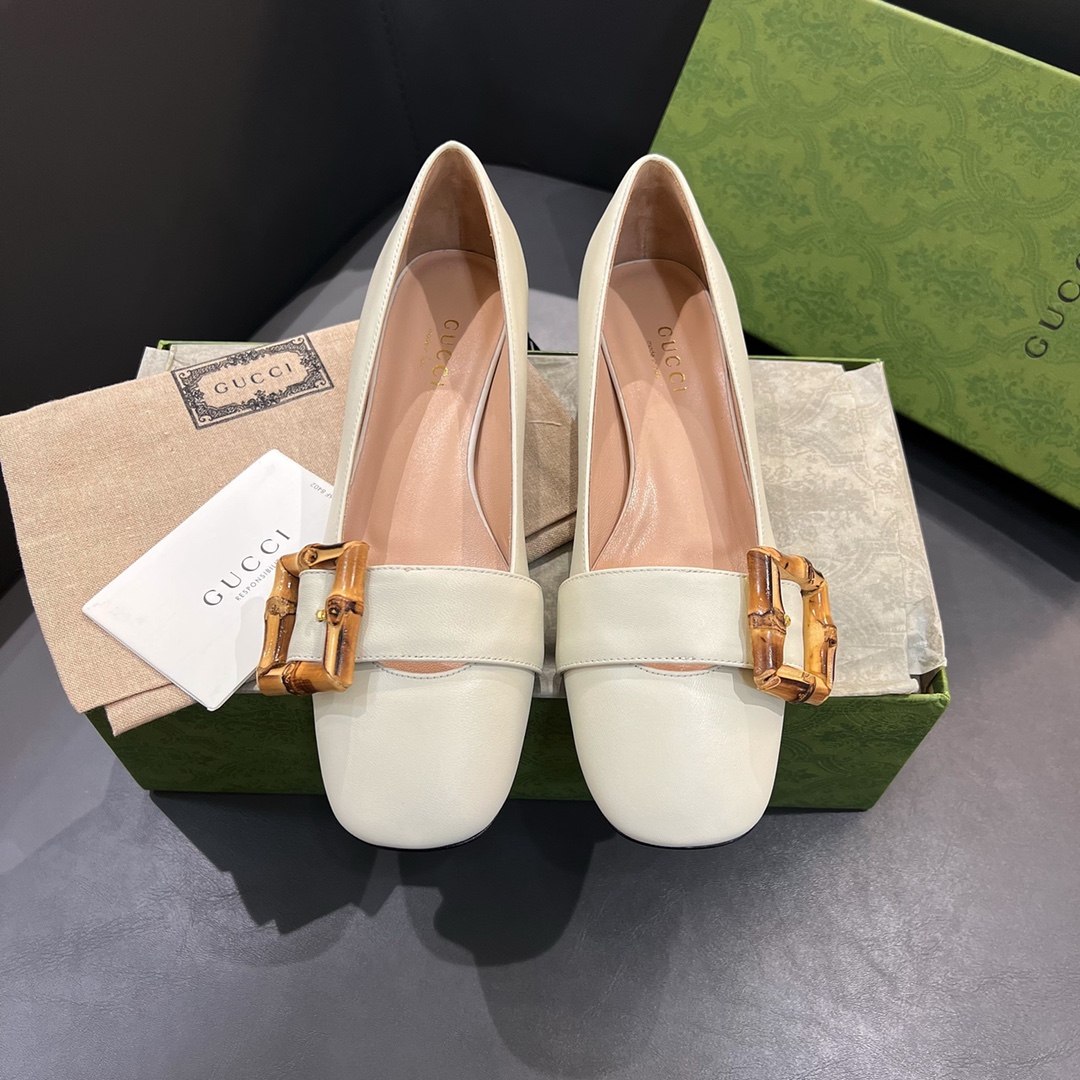 G*u*i loafers