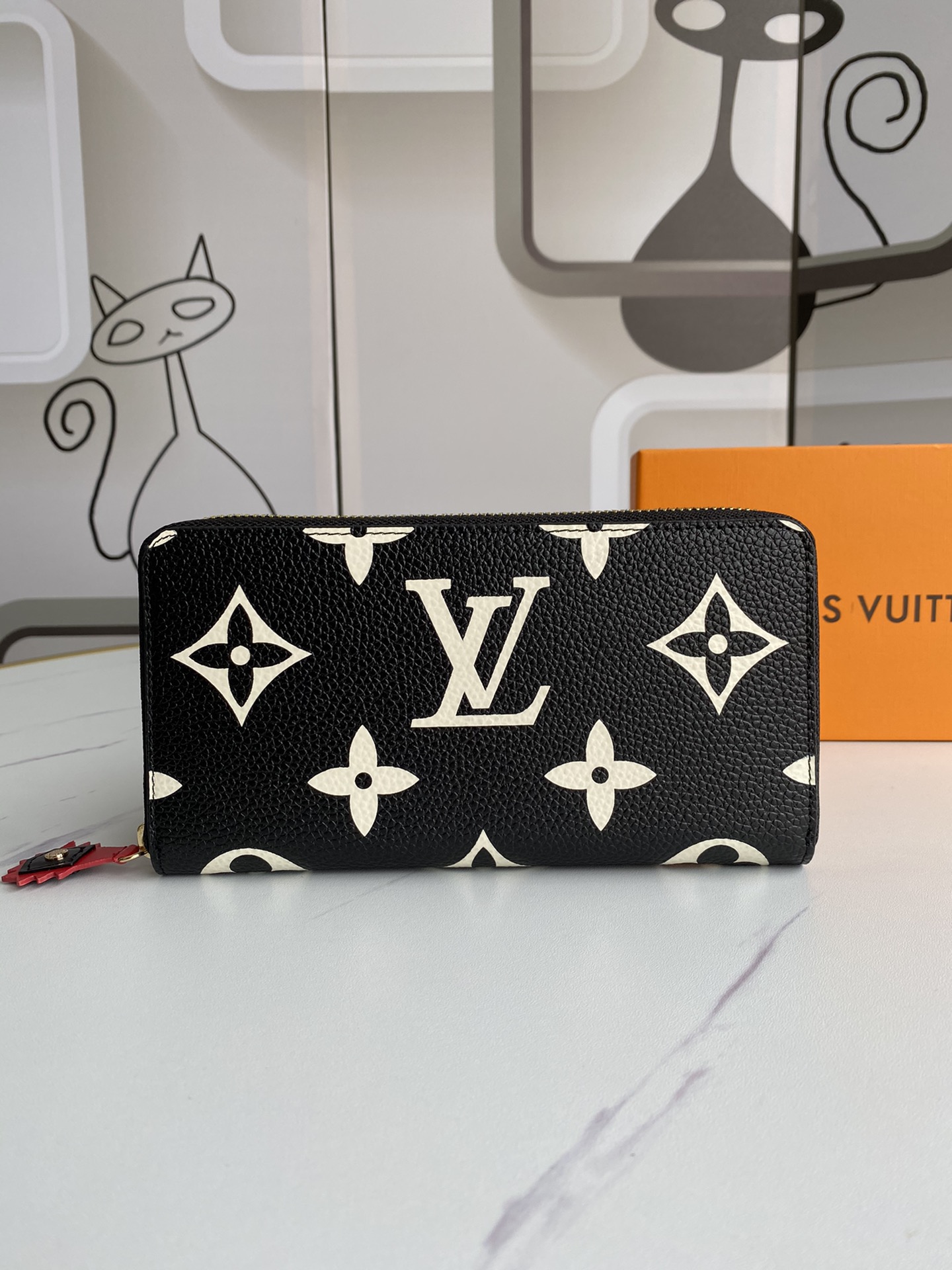 L0vis Vvtt0n Monogram Empreinte Zippy Wallet -19*10CM