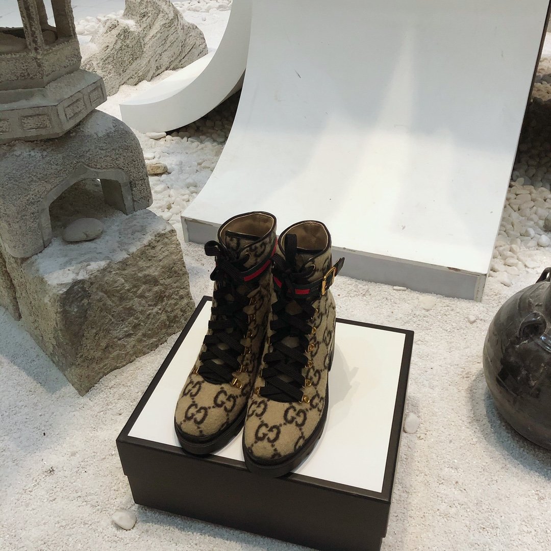 G*u*i boots