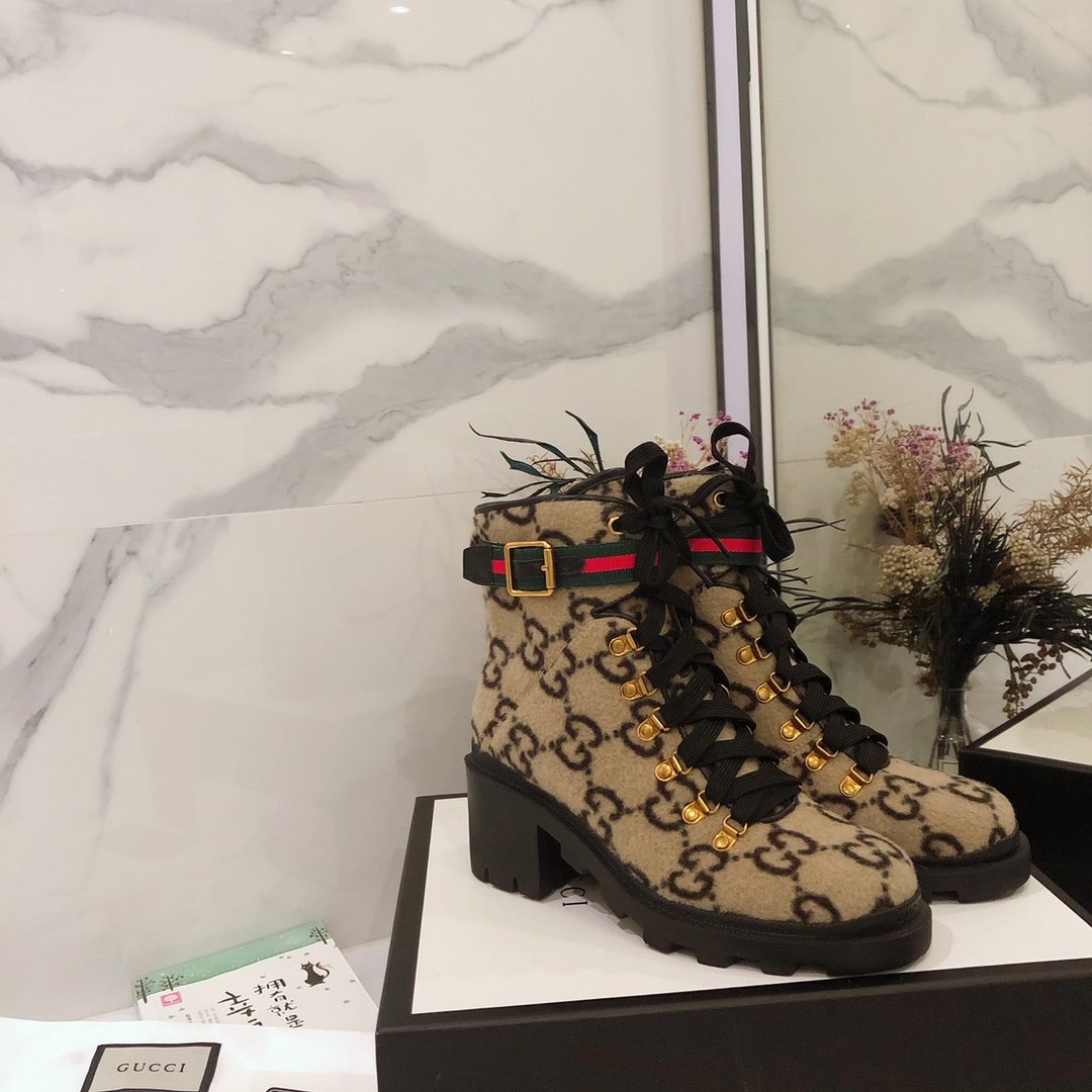 G*u*i boots