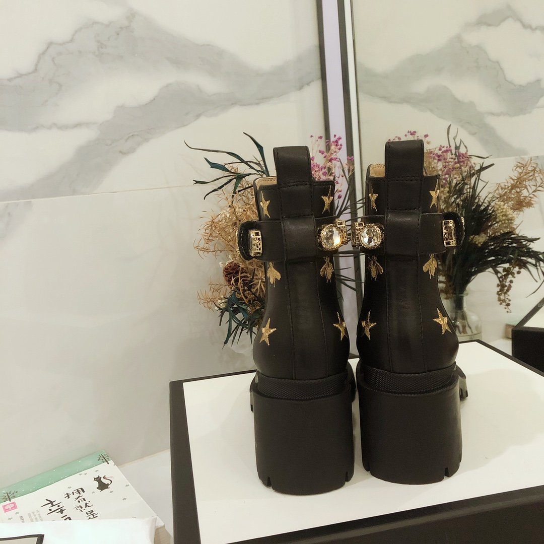G*u*i boots
