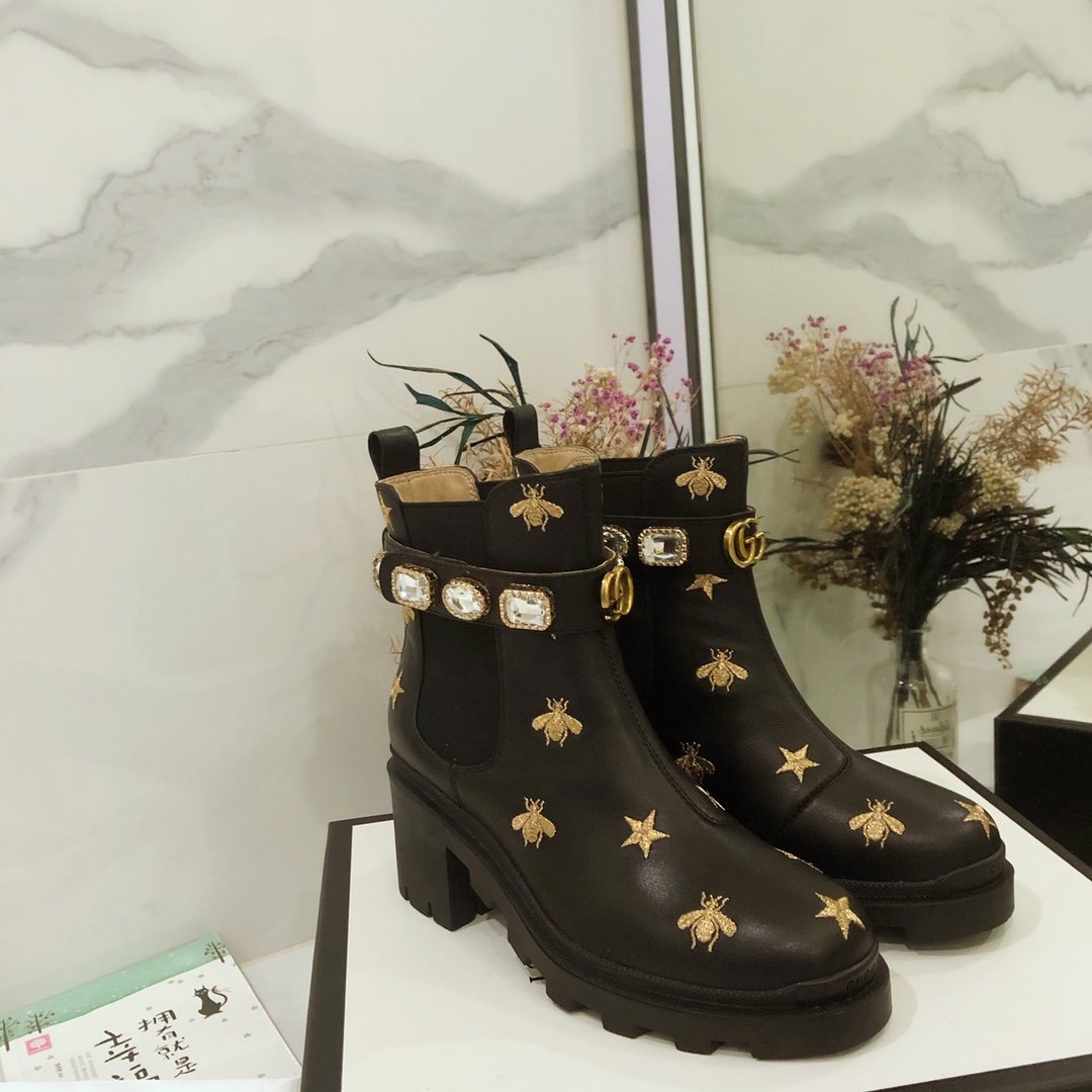 G*u*i boots