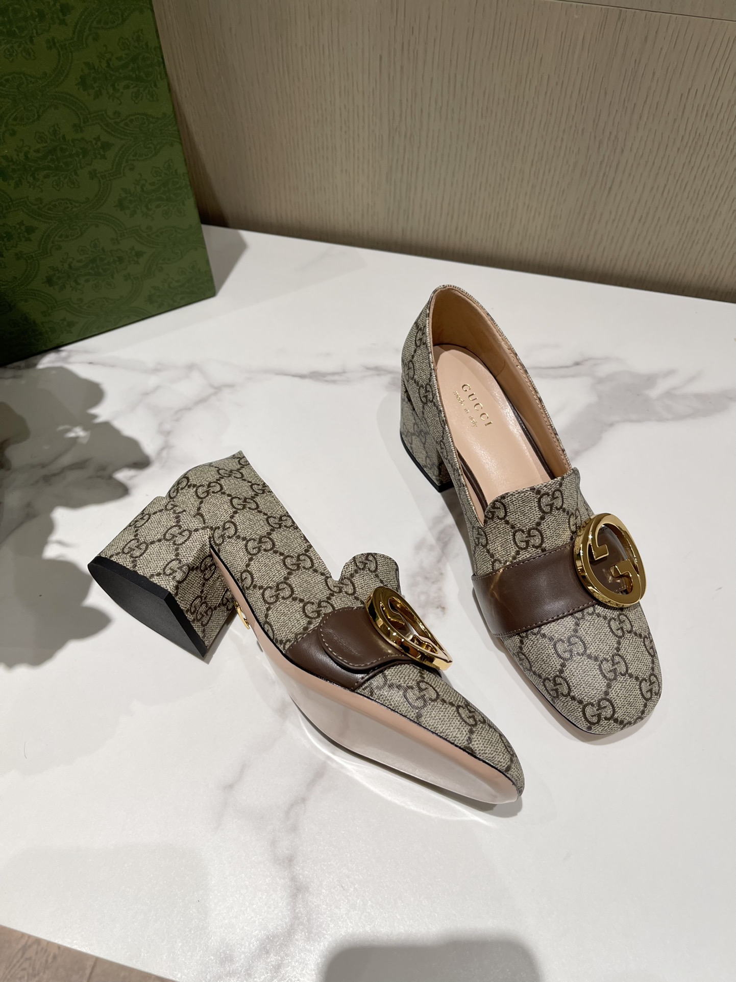 G*u*i loafers