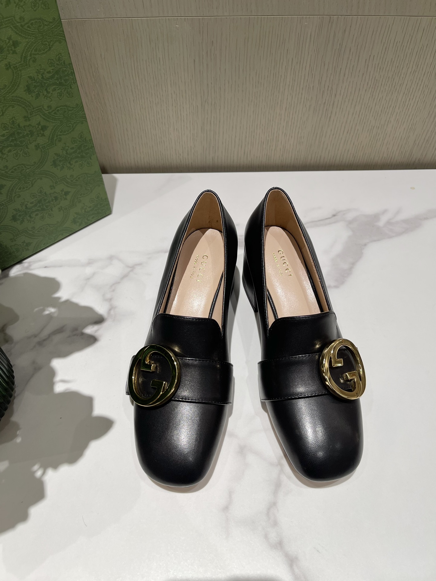 G*u*i loafers