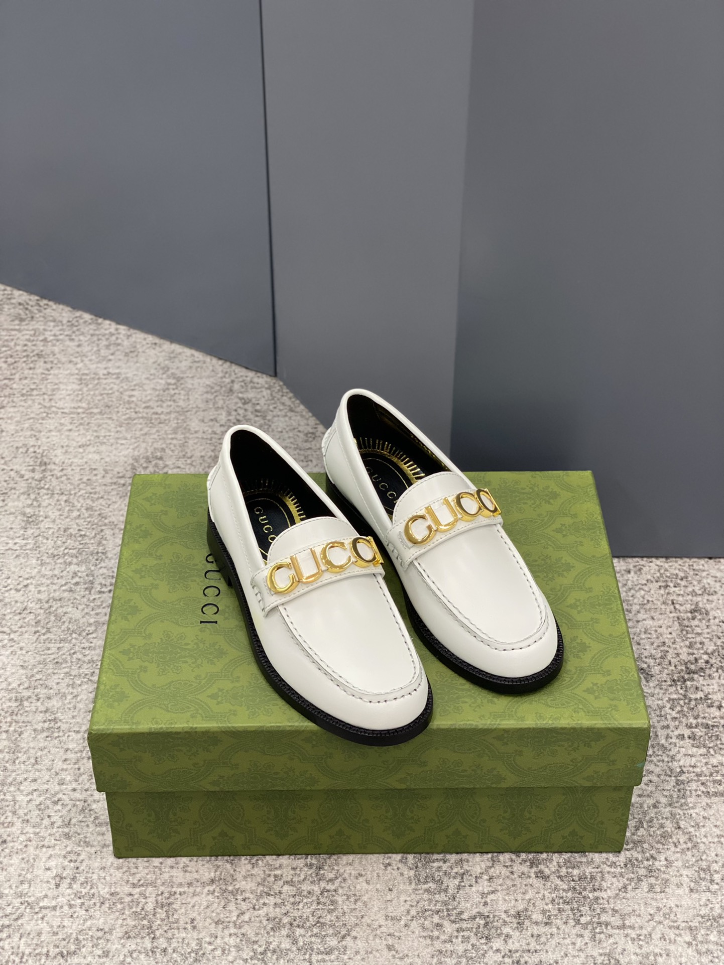 G*u*i loafers