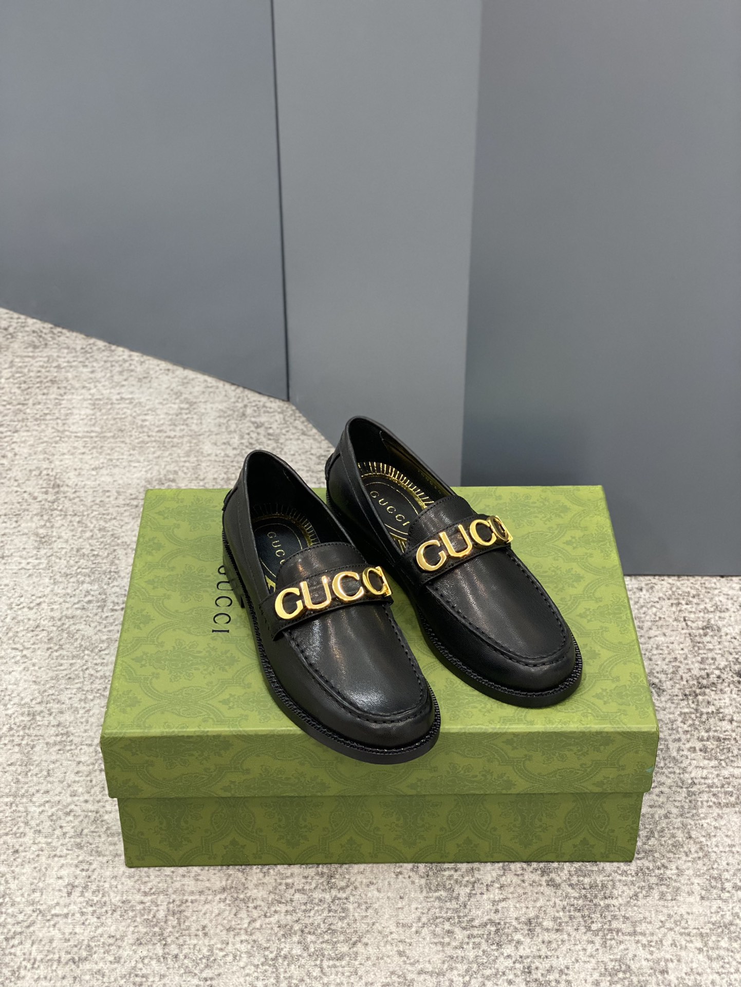 G*u*i loafers