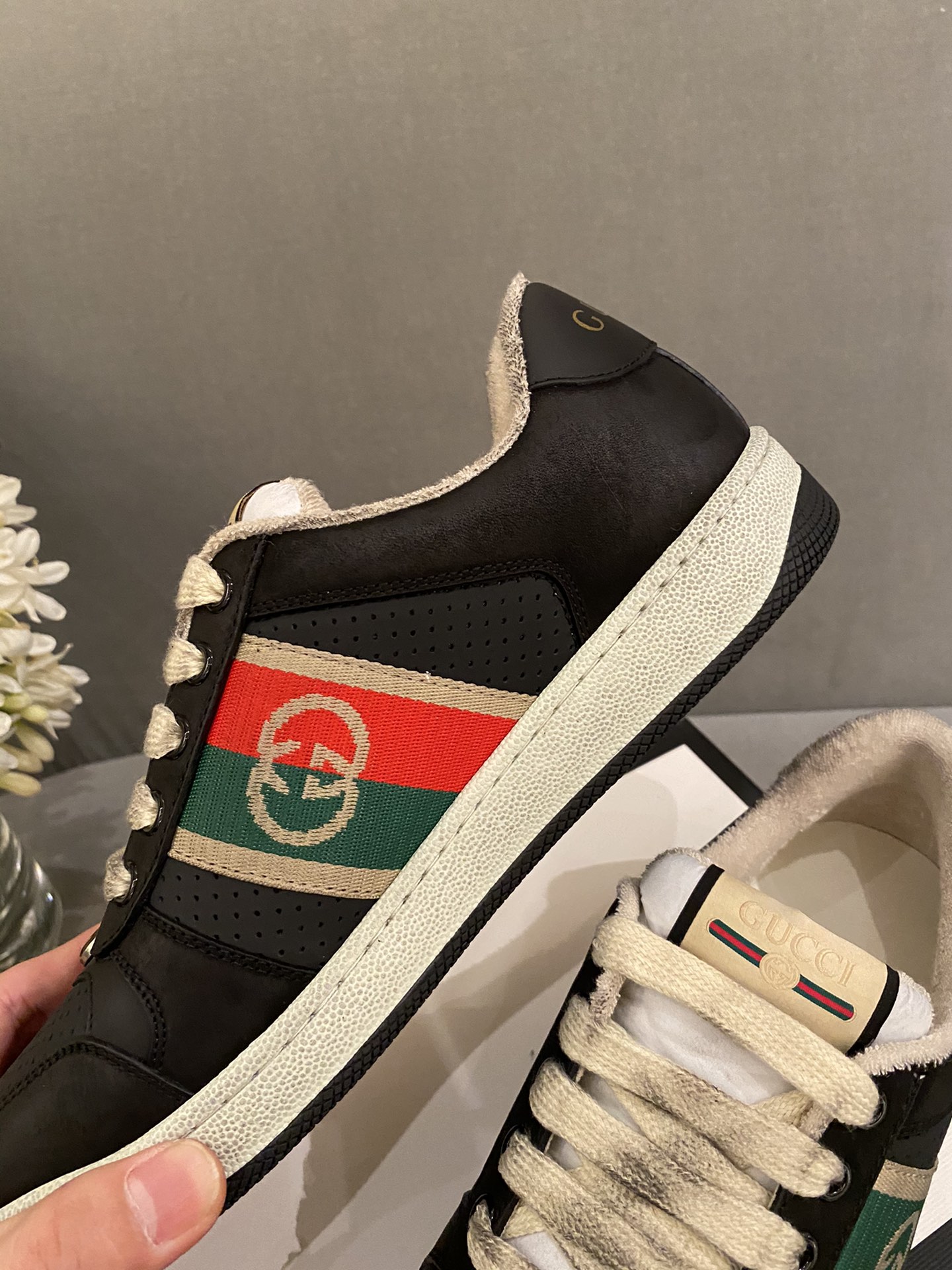 G*u*i sneakers