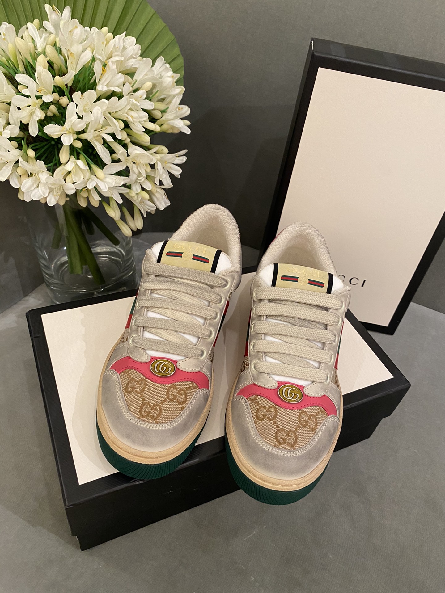 G*u*i sneakers