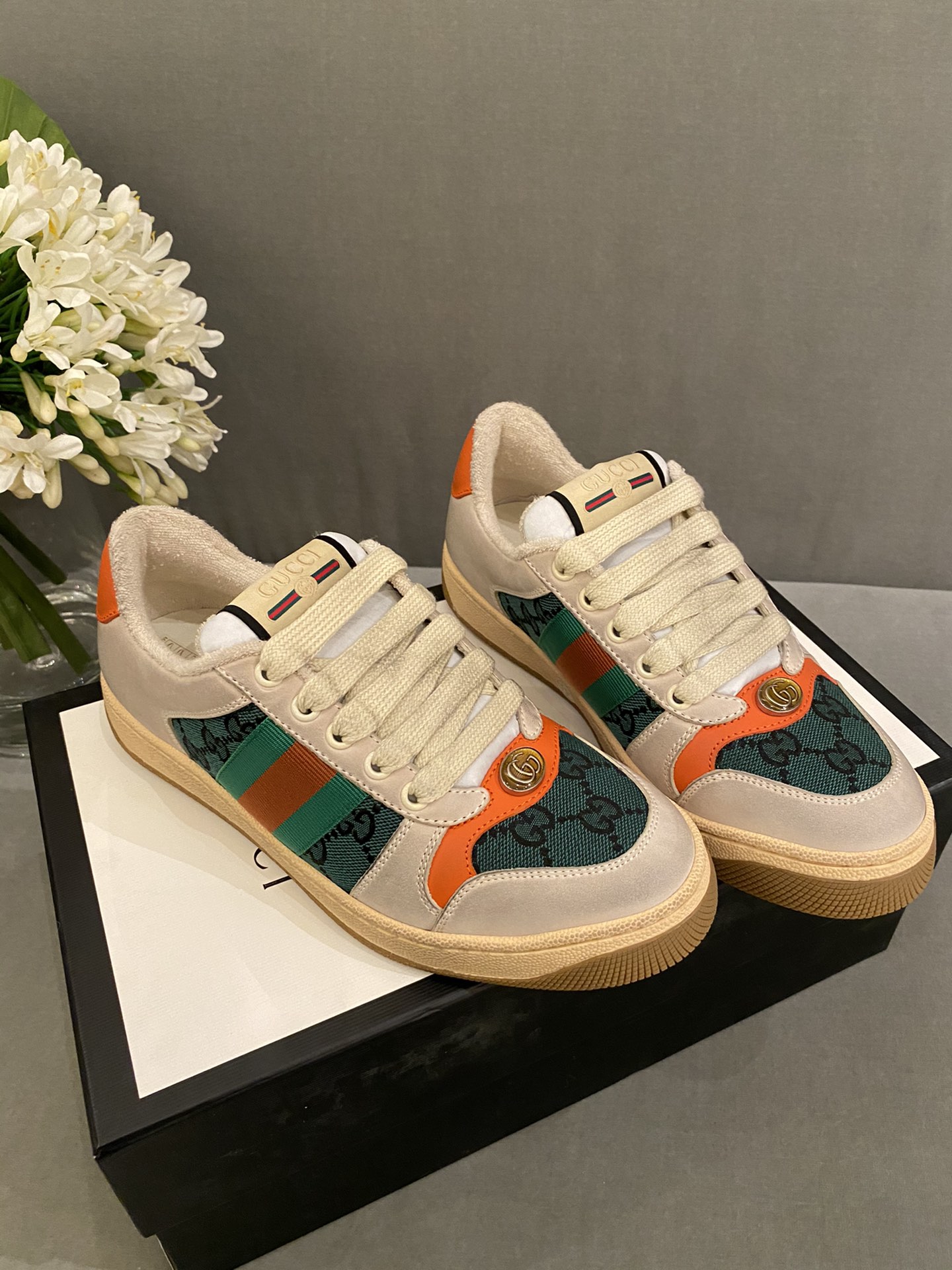G*u*i sneakers
