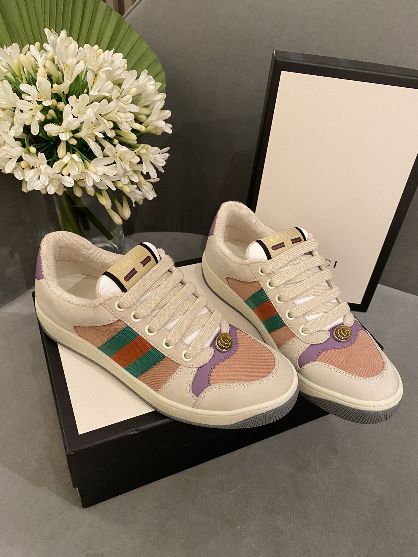 G*u*i sneakers