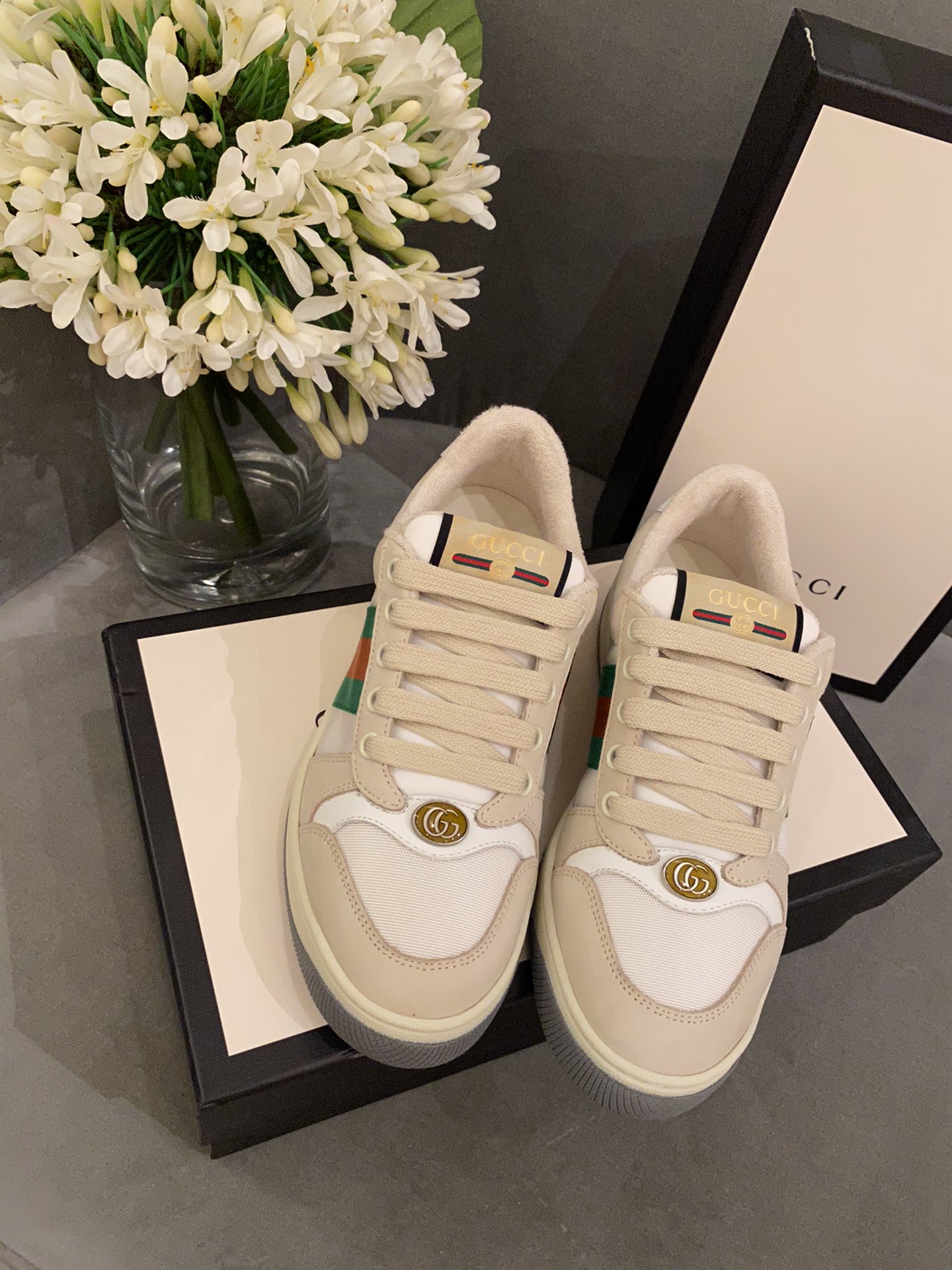 G*u*i sneakers