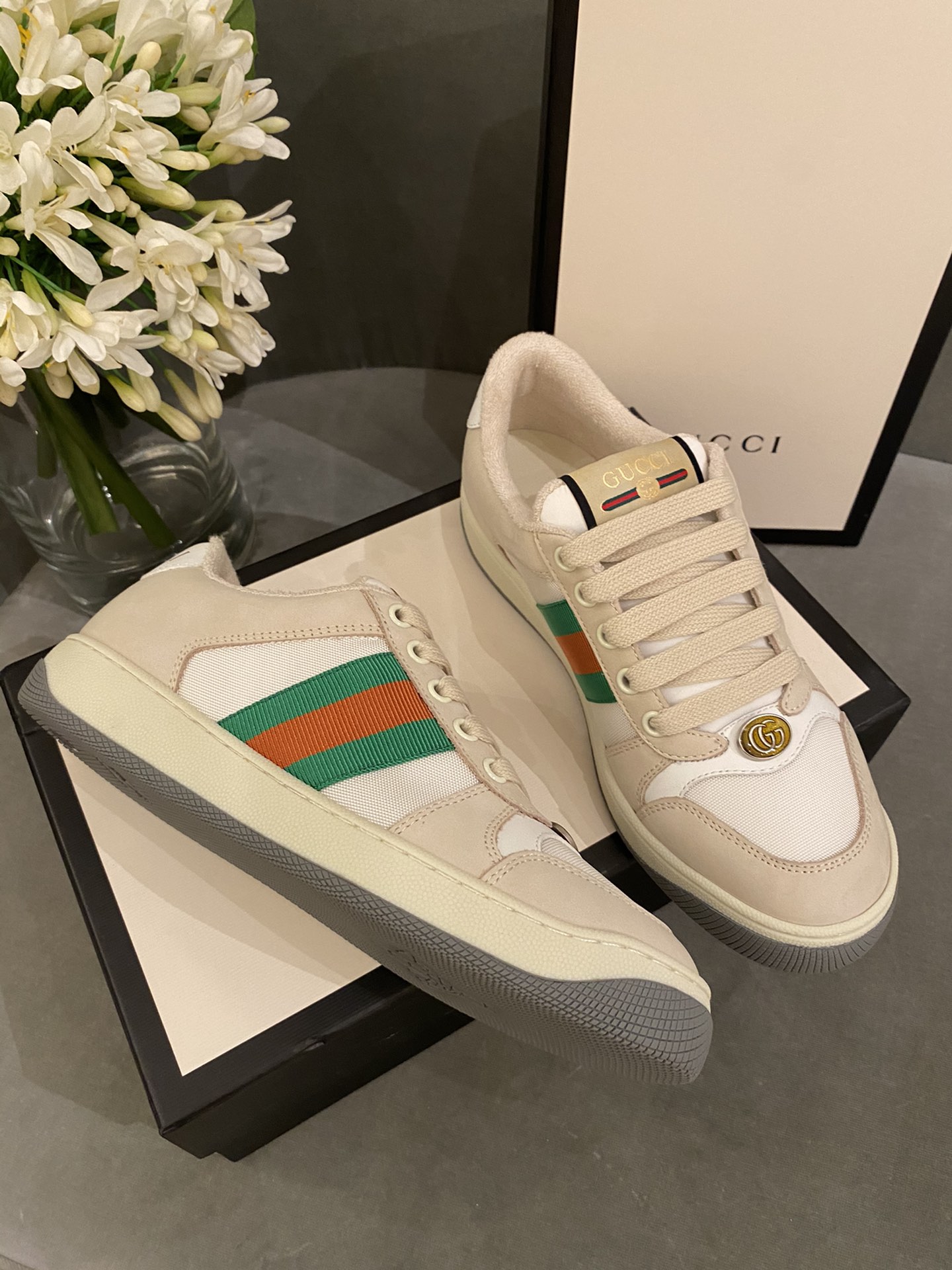 G*u*i sneakers
