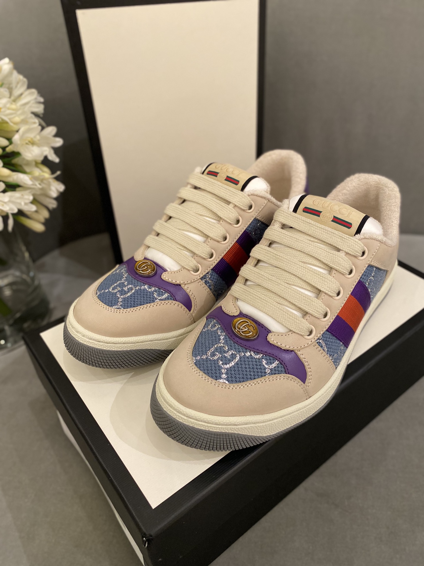 G*u*i sneakers