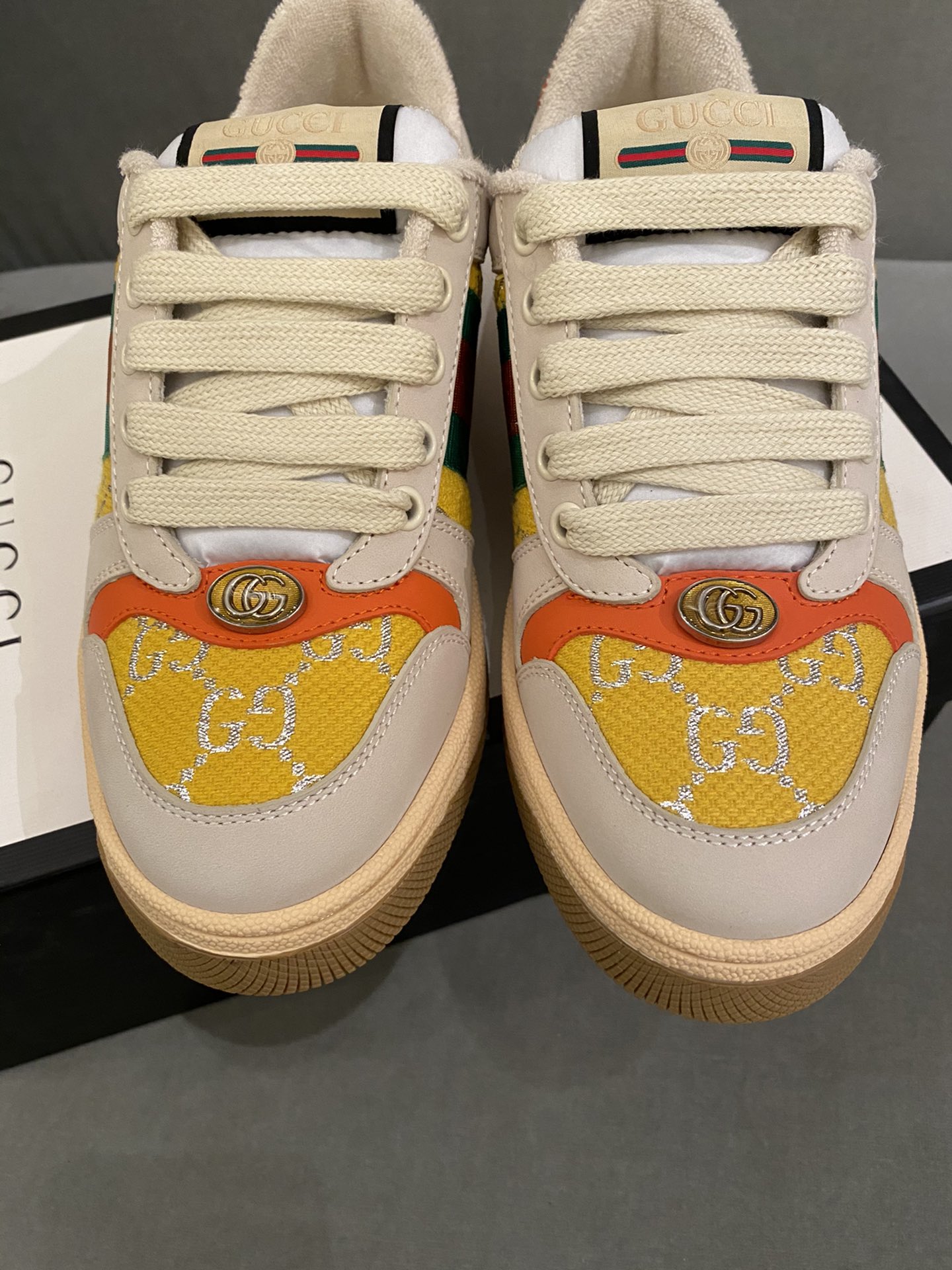 G*u*i sneakers