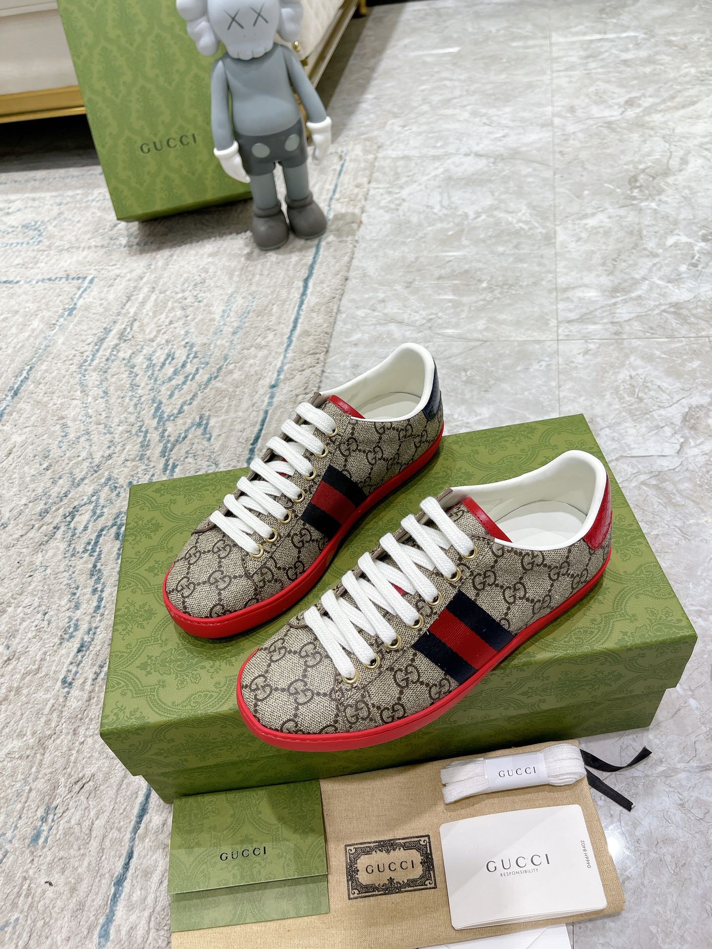 G*u*i sneakers