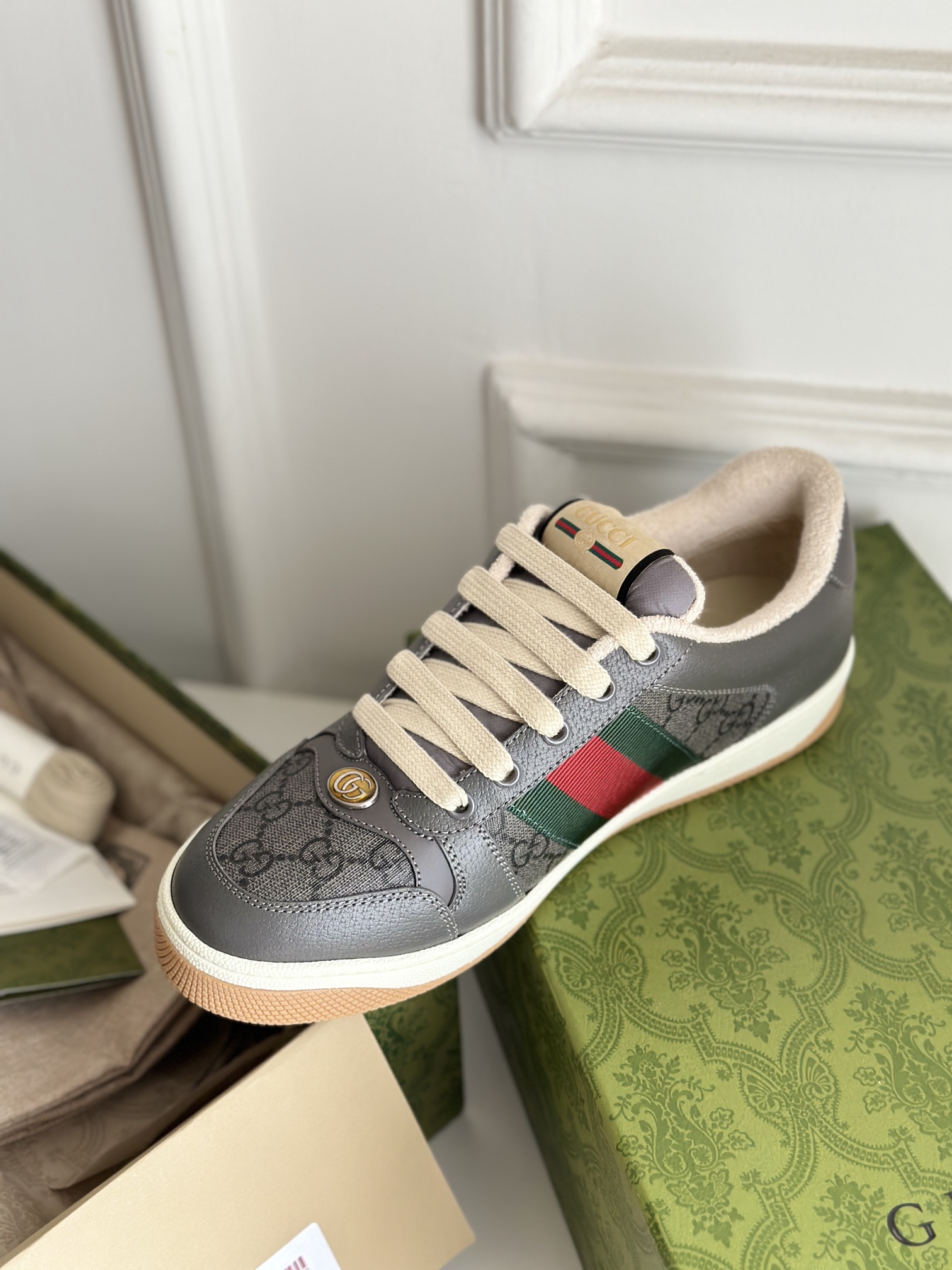 G*u*i sneakers