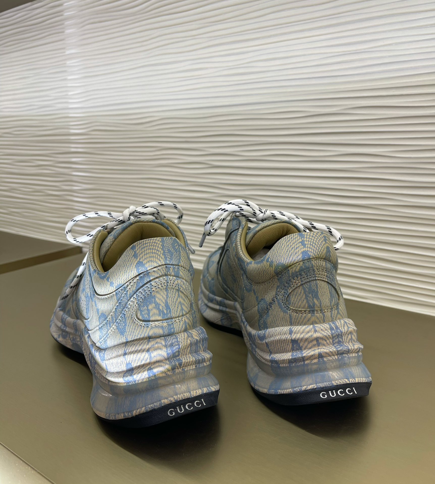 G*u*i sneakers