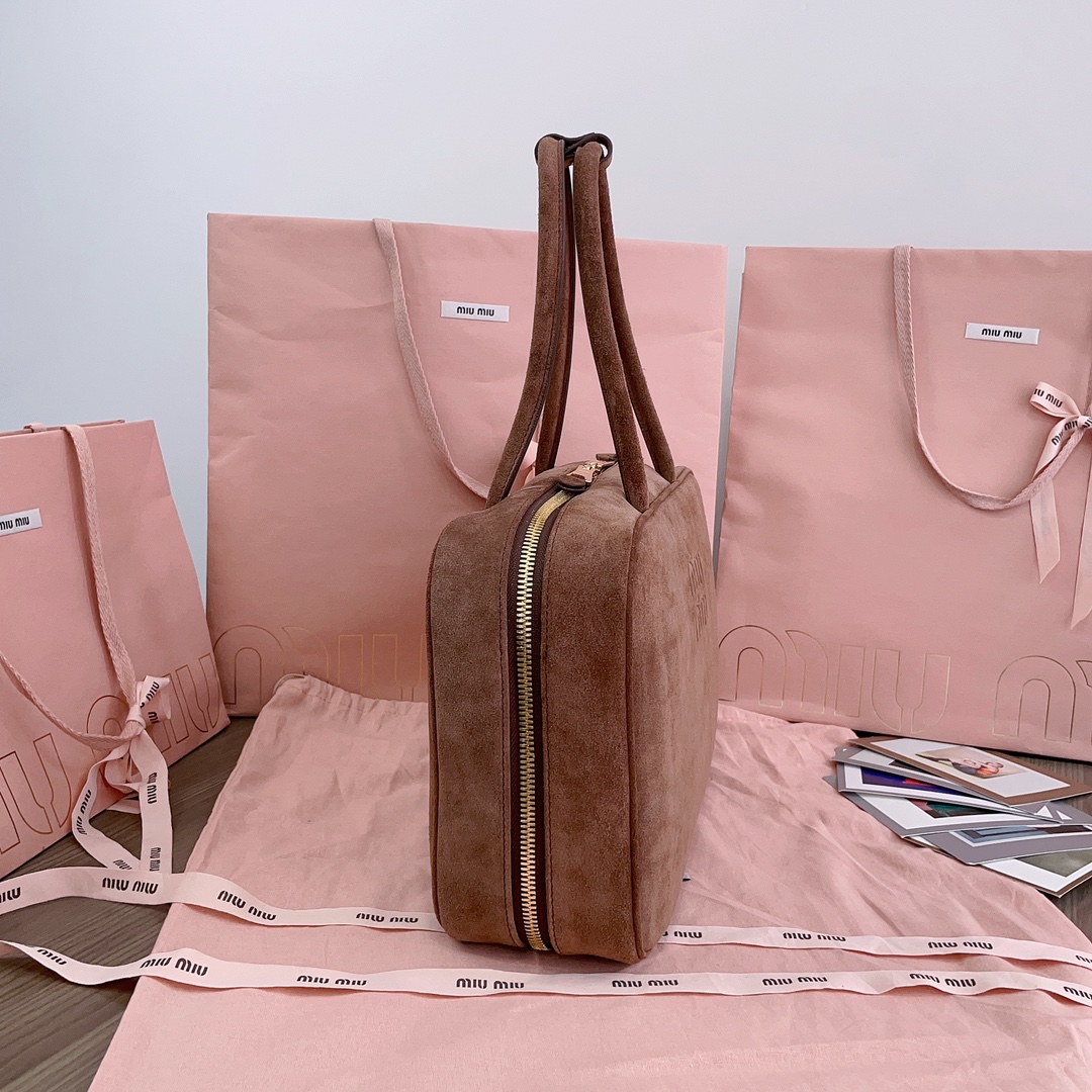 M*um*u leather top handbag-34x23x12cm