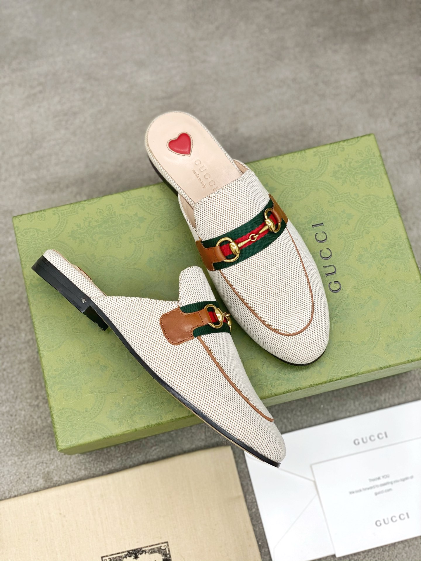 G*u*i loafers