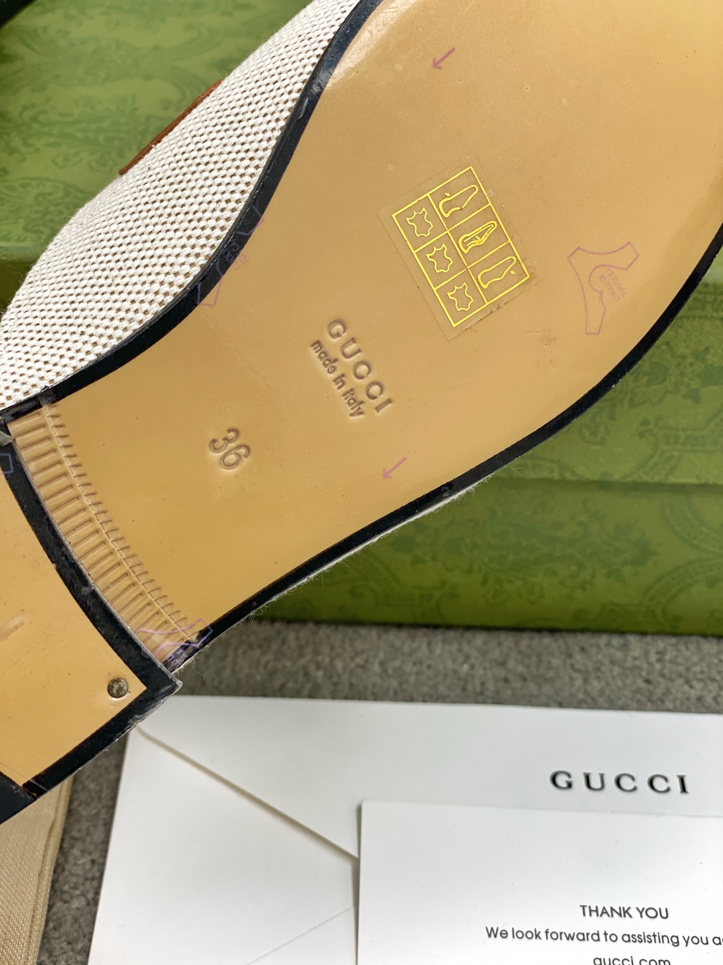 G*u*i loafers