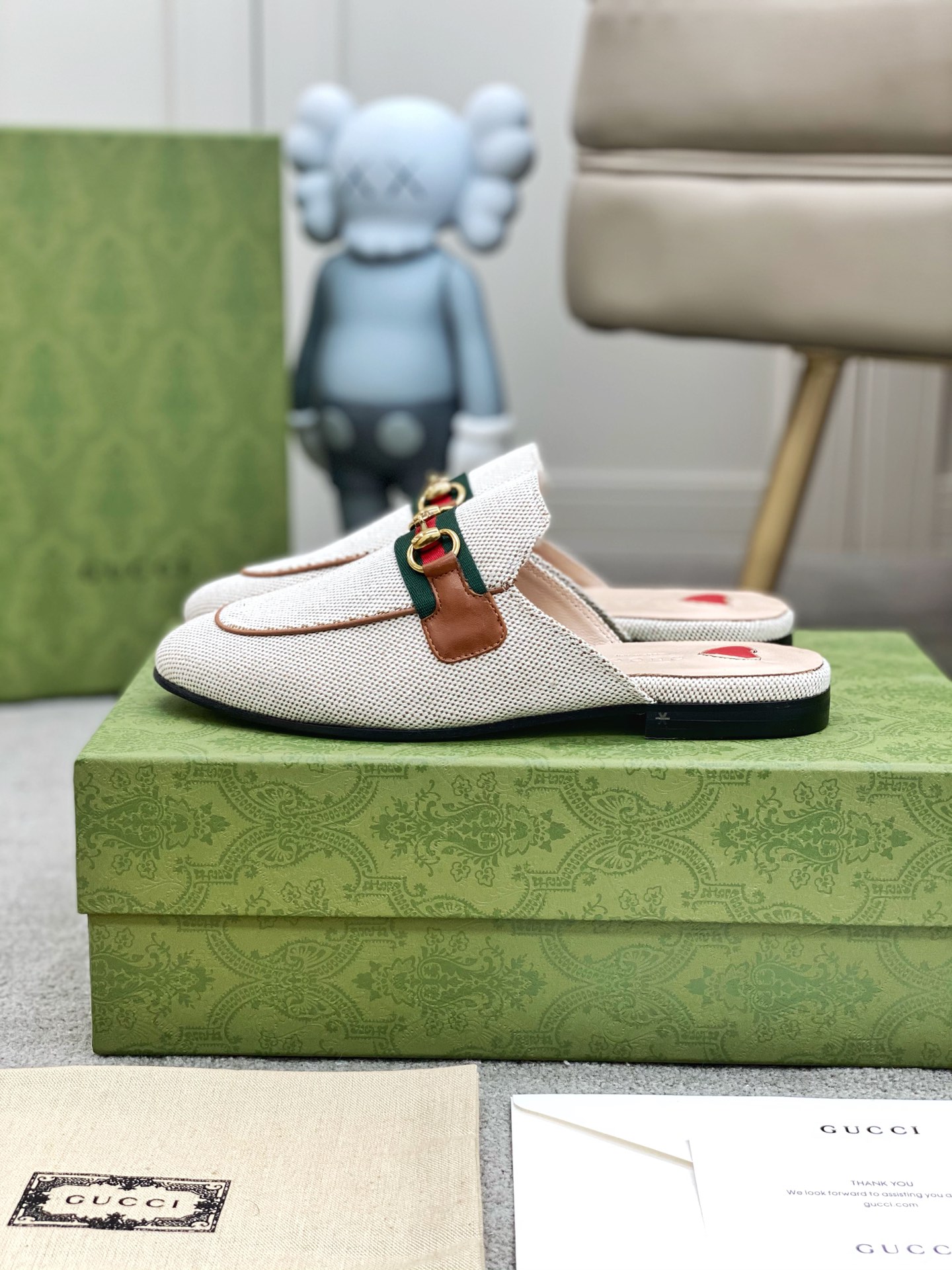 G*u*i loafers