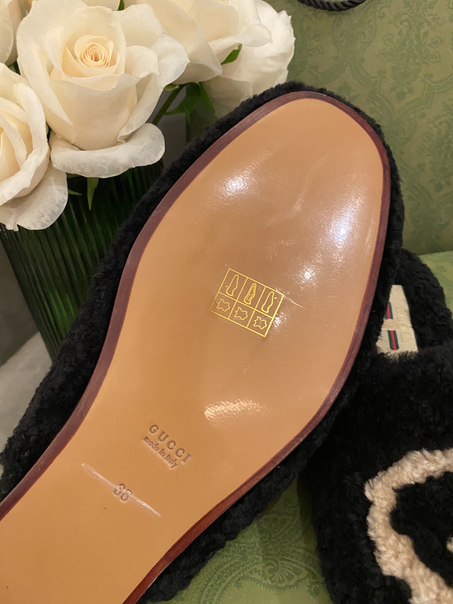 G*u*i loafers